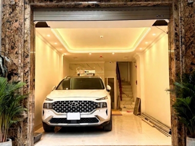 trần quốc hoàn DT 45m x7 tầng thang máy 21,7 tỷ phân lô,gara ô tô,kinh doanh