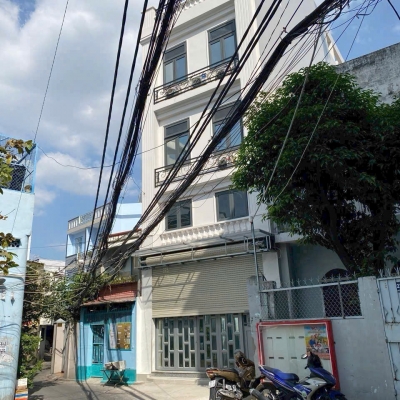 Bán nhà diện tích 120m2 có tổng 19P, gần chợ Huỳnh Đình Hai, BT - 6.1 x 20m - 6 tầng thang máy, HXH, chỉ 18 tỷ TL